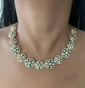 Asymmetric Kundan Necklace set with green Meenakari