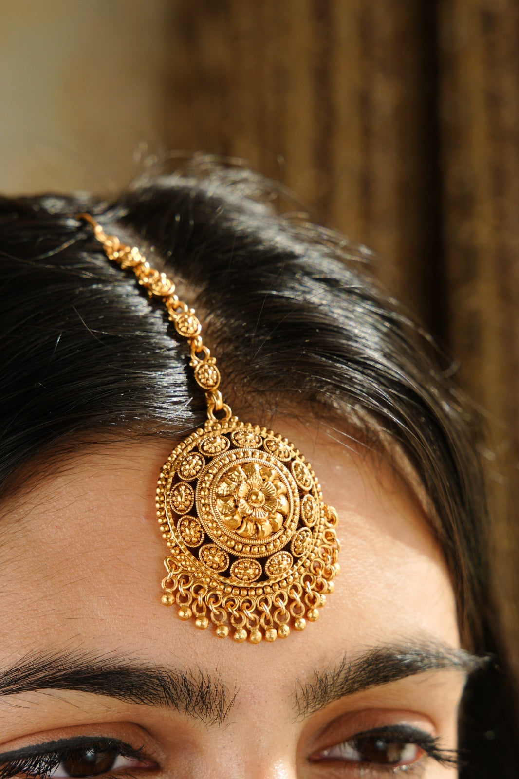 Antique Gold Round Tukdi Choker Set with Jhumkis & Tikka – A Versatile Wedding Essential