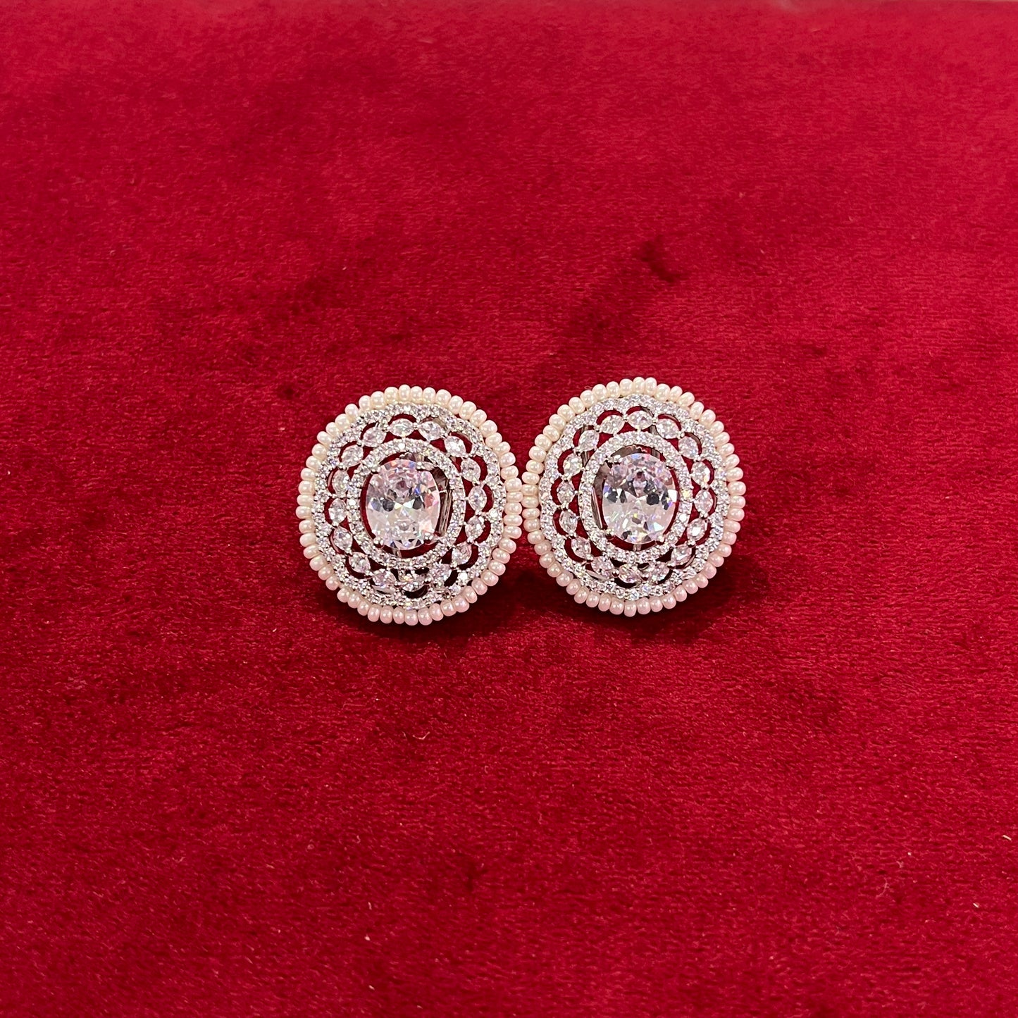 Elegant Oval Diamond Studs with Pearl Peroi Border